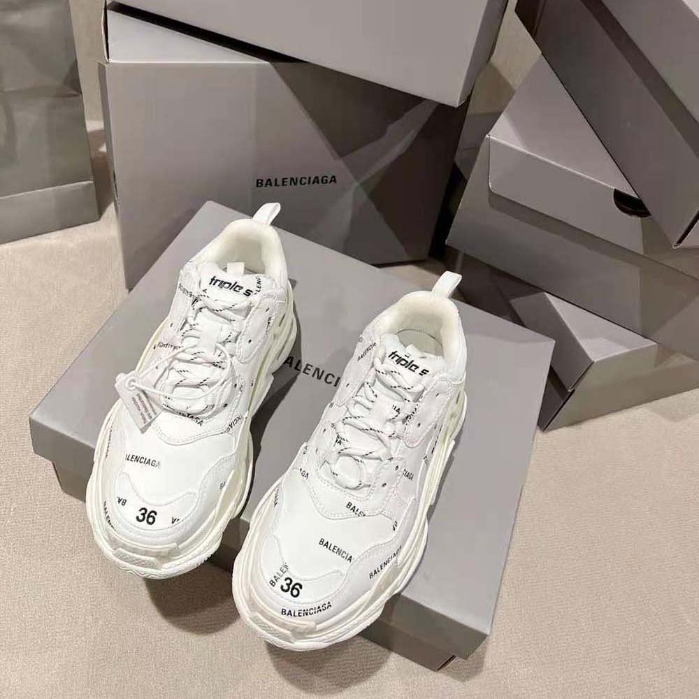 Side view showcasing silhouette of Balenciaga Unisex Triple S Sneaker technical material