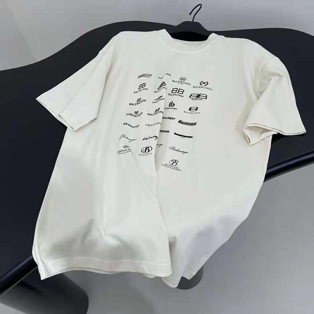 Side angle showcasing oversized fit of Balenciaga Men Archives Logos T-shirt