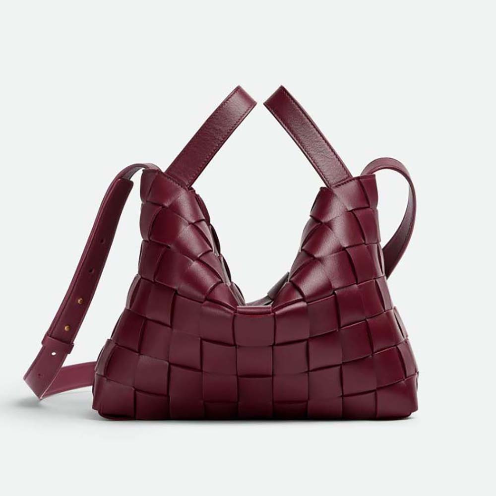 Front view of Bottega Veneta Women Bowling Cassette Medium Intreccio Leather Bowling Bag in maroon