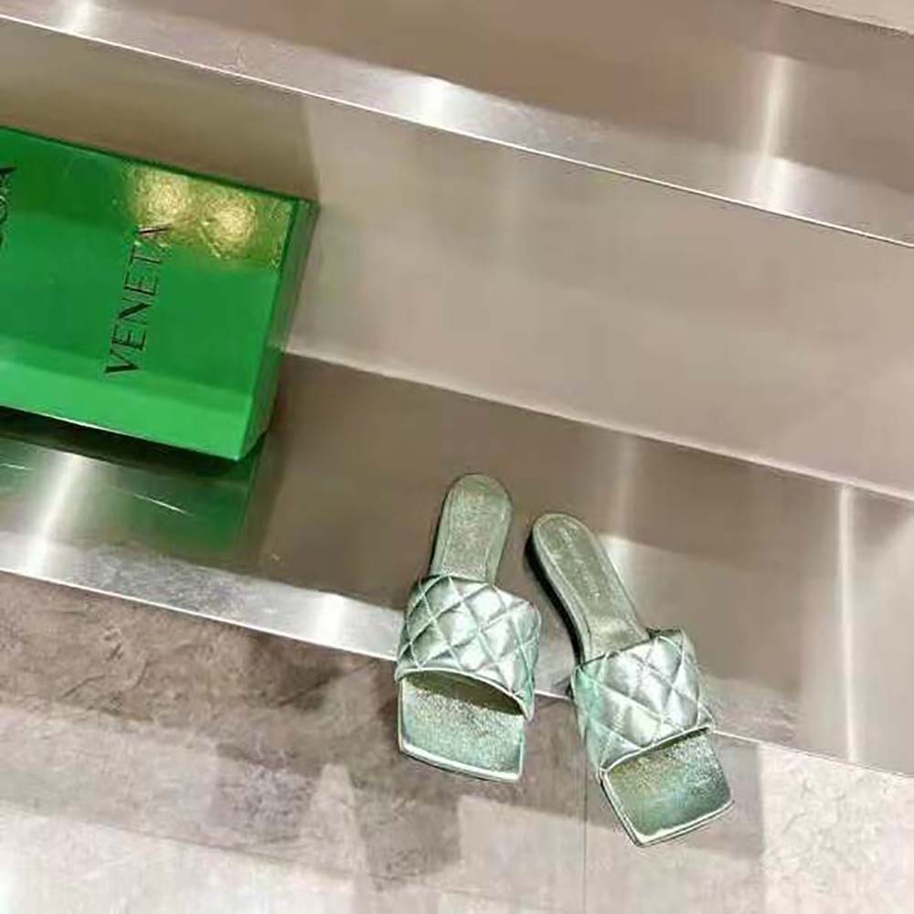 Top view showing flat silhouette of Bottega Veneta Lido Flat Sandal in aqua