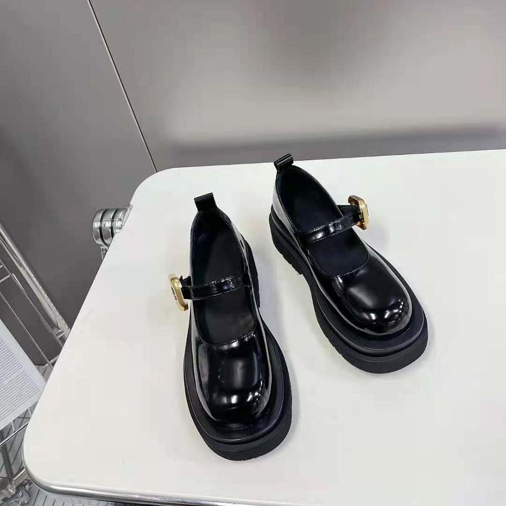 Close-up of intrecciato leather detail on flats