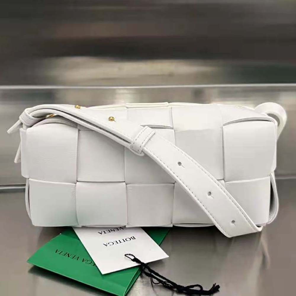 Close-up of signature woven leather detail on Bottega Veneta Small Brick Cassette