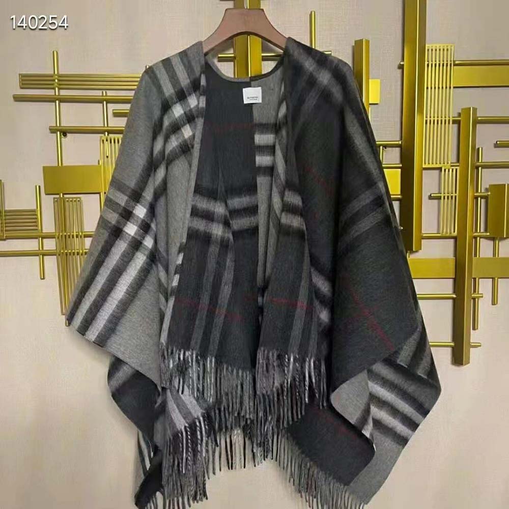 Close-up detail of signature check pattern on Burberry wool cashmere cape