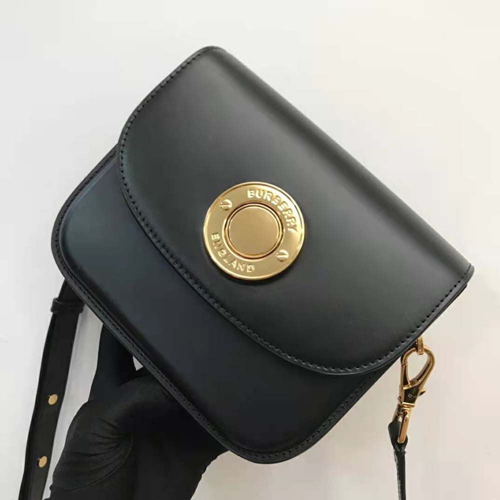 Side angle of Burberry Women Leather Small Elizabeth Bag-Black highlighting strap