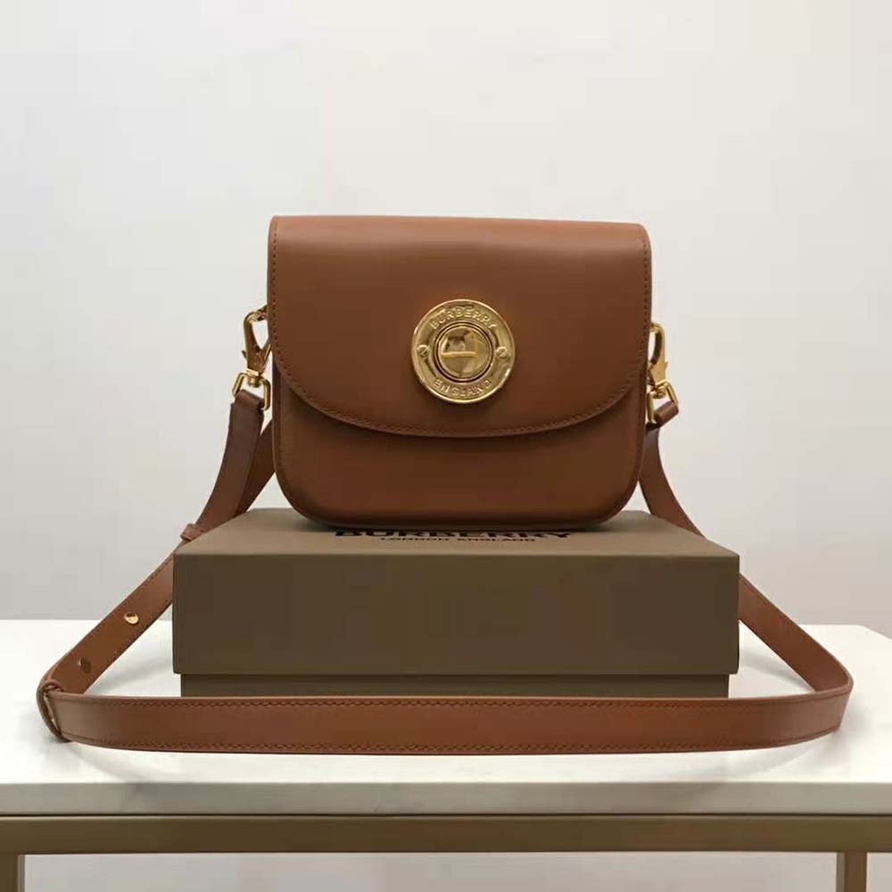 Close-up of gold hardware on Burberry Women Leather Small Elizabeth Bag-Brown