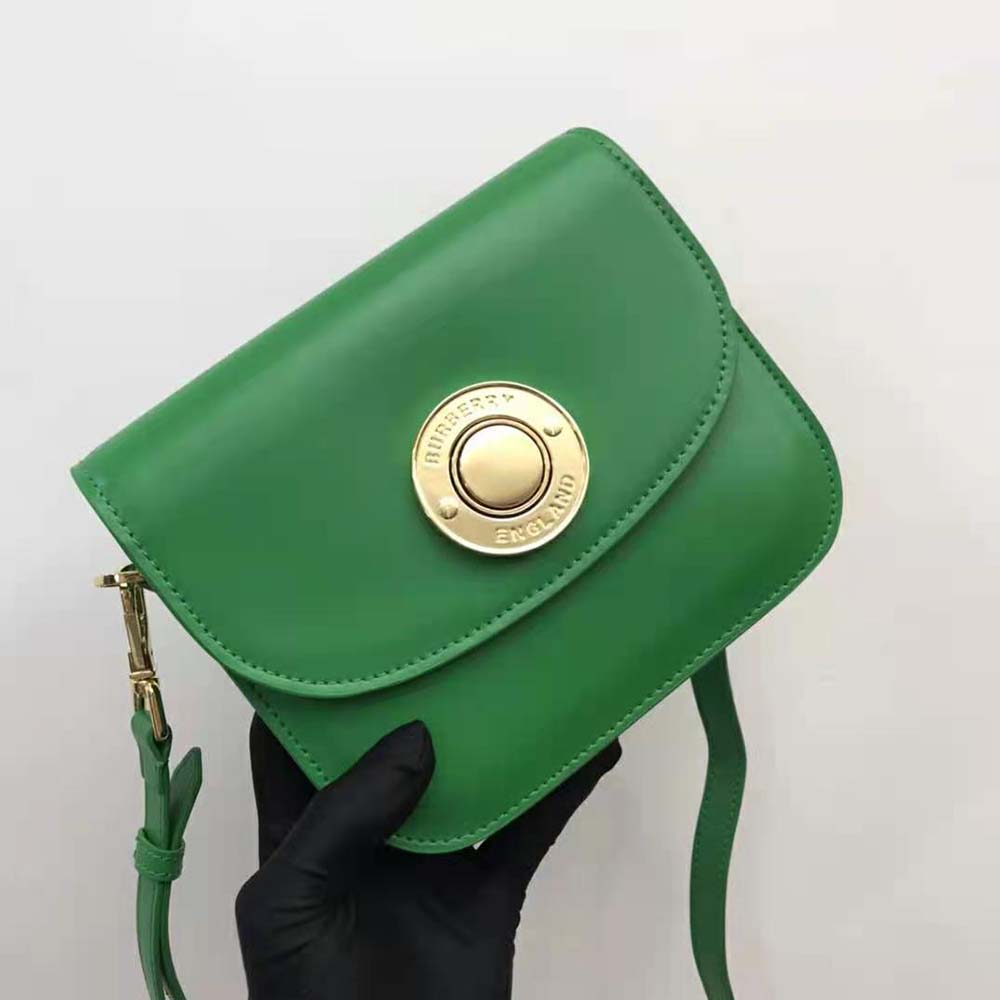 Close-up of textured green leather and hardware on Burberry Women Leather Small Elizabeth Bag-Green