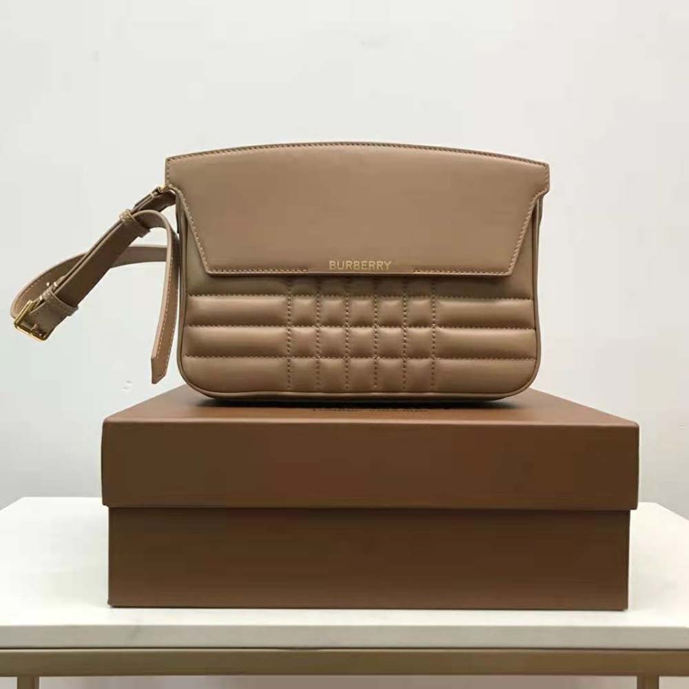 Close-up of gold hardware clasp on Burberry Women Quilted Leather Catherine Shoulder Bag-Sandy