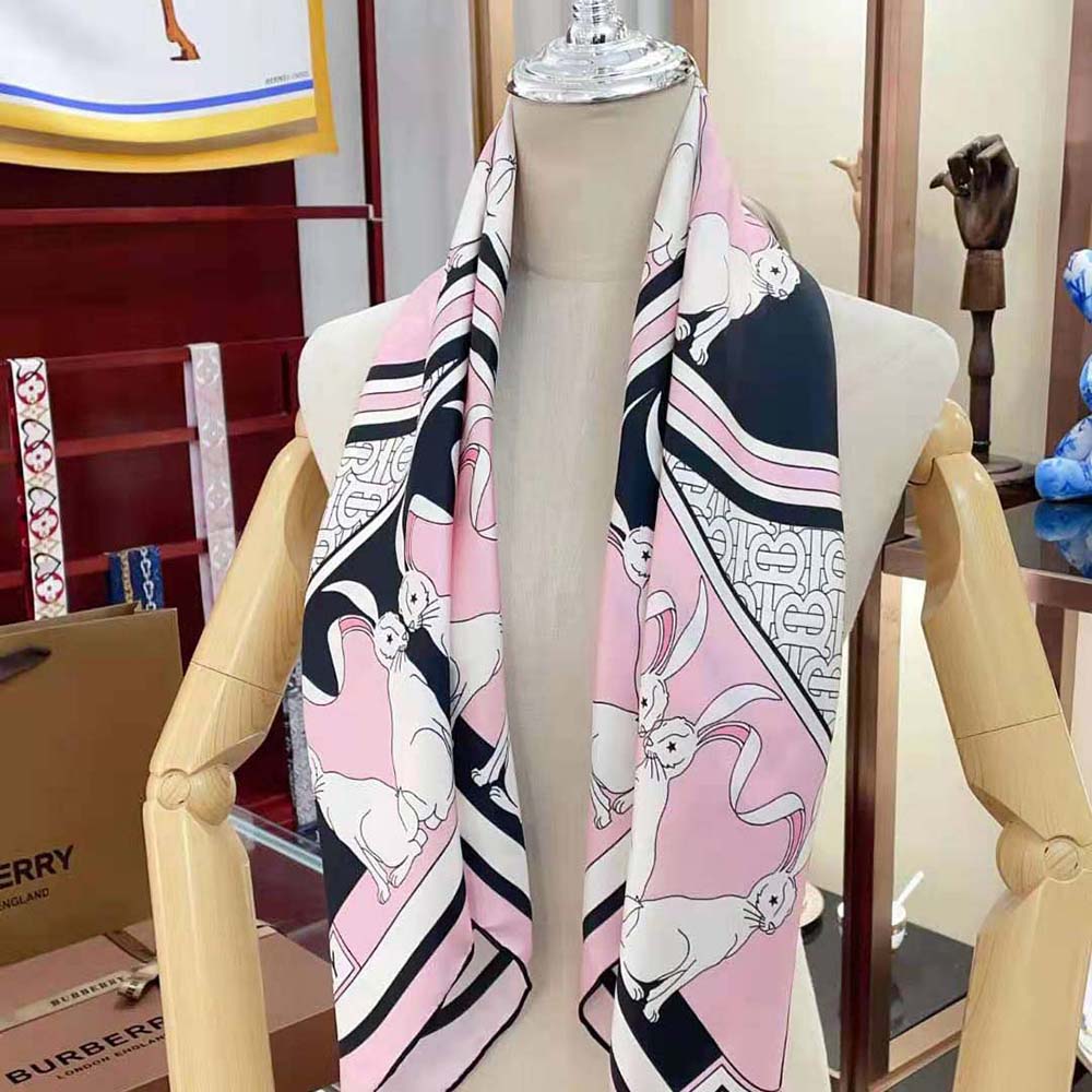 Styled look with Burberry Women Rabbit Print Silk Square Scarf-Pink tied at neck