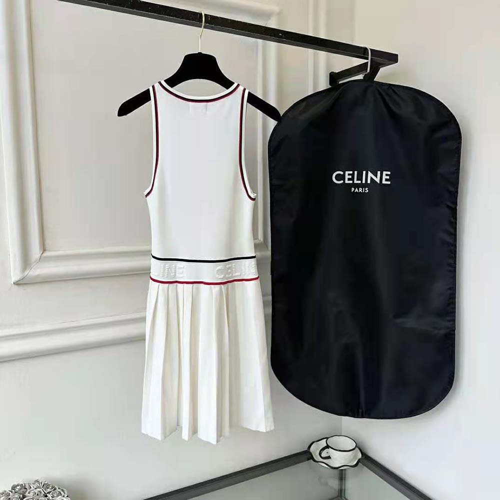 Side angle showing sleek silhouette of Celine Women Athletic Dress in White