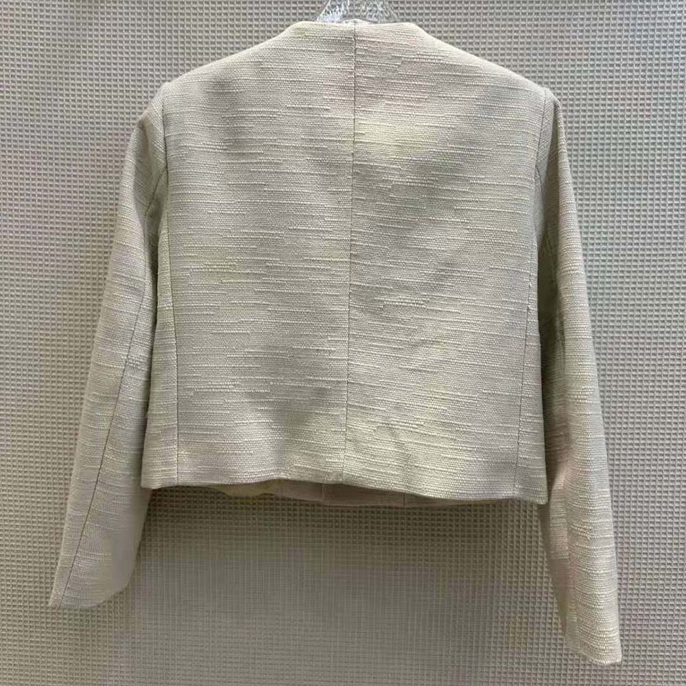Side profile showing cropped fit of Celine Women Silk Military Jacket