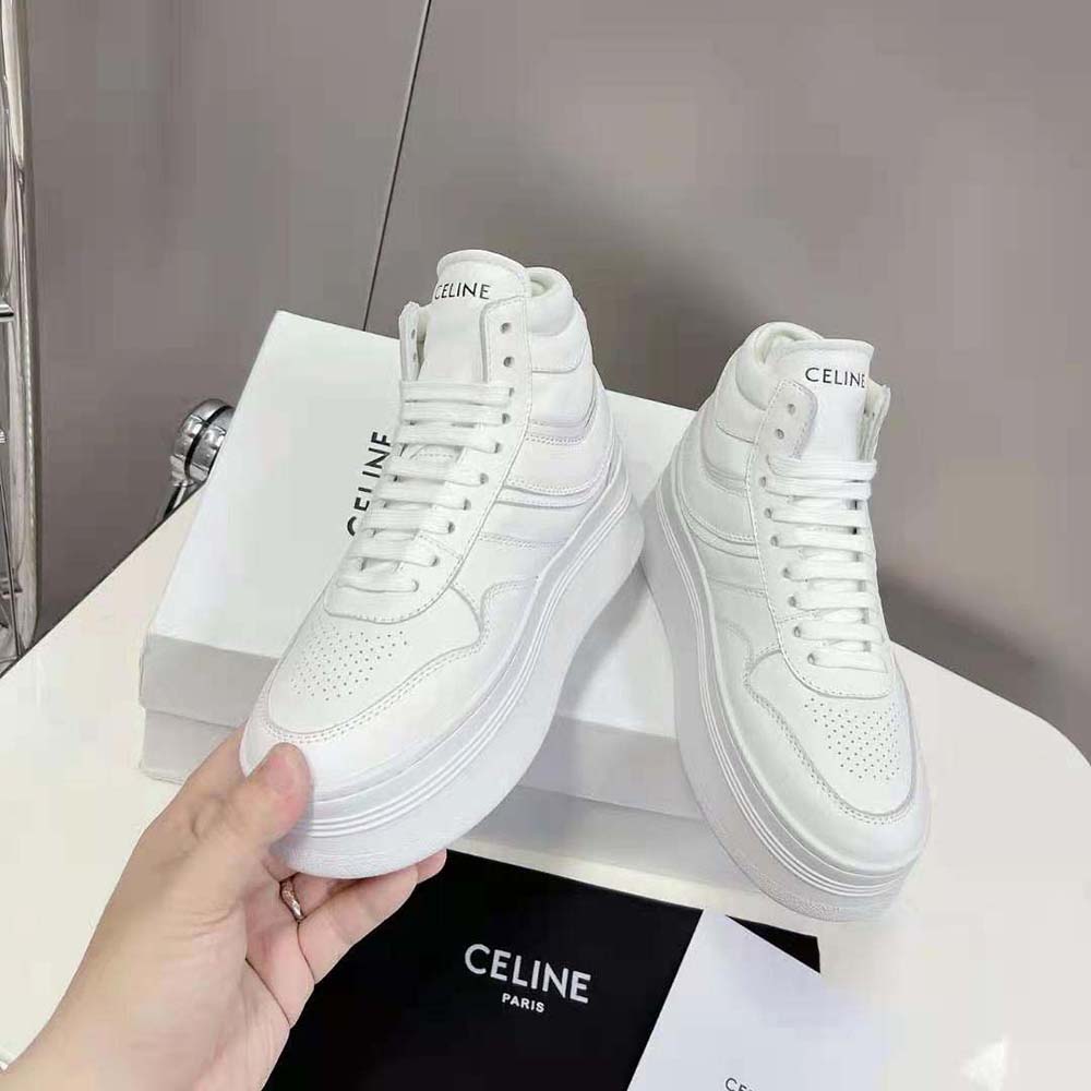 Overhead shot showing laces and high-top silhouette of Celine white wedge sneakers