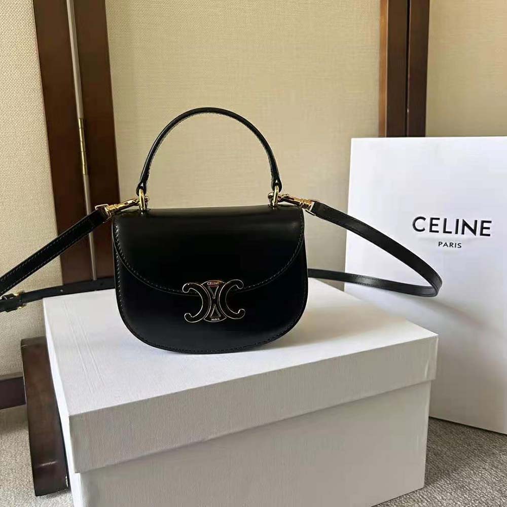 Close-up of gold-tone Triomphe clasp on Celine Women Mini Besace Triomphe