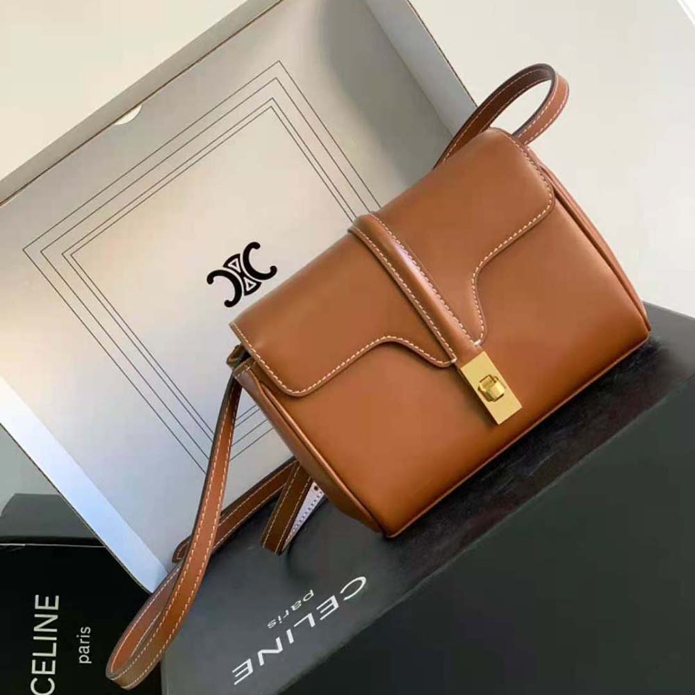Side profile showing compact silhouette and adjustable strap
