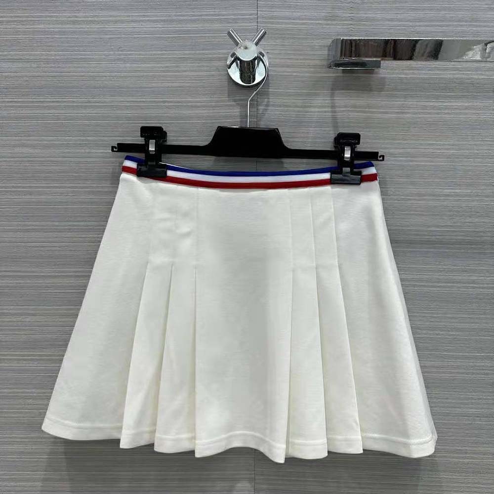 Side angle showcasing silhouette of Celine Women Short Pleated Skirt