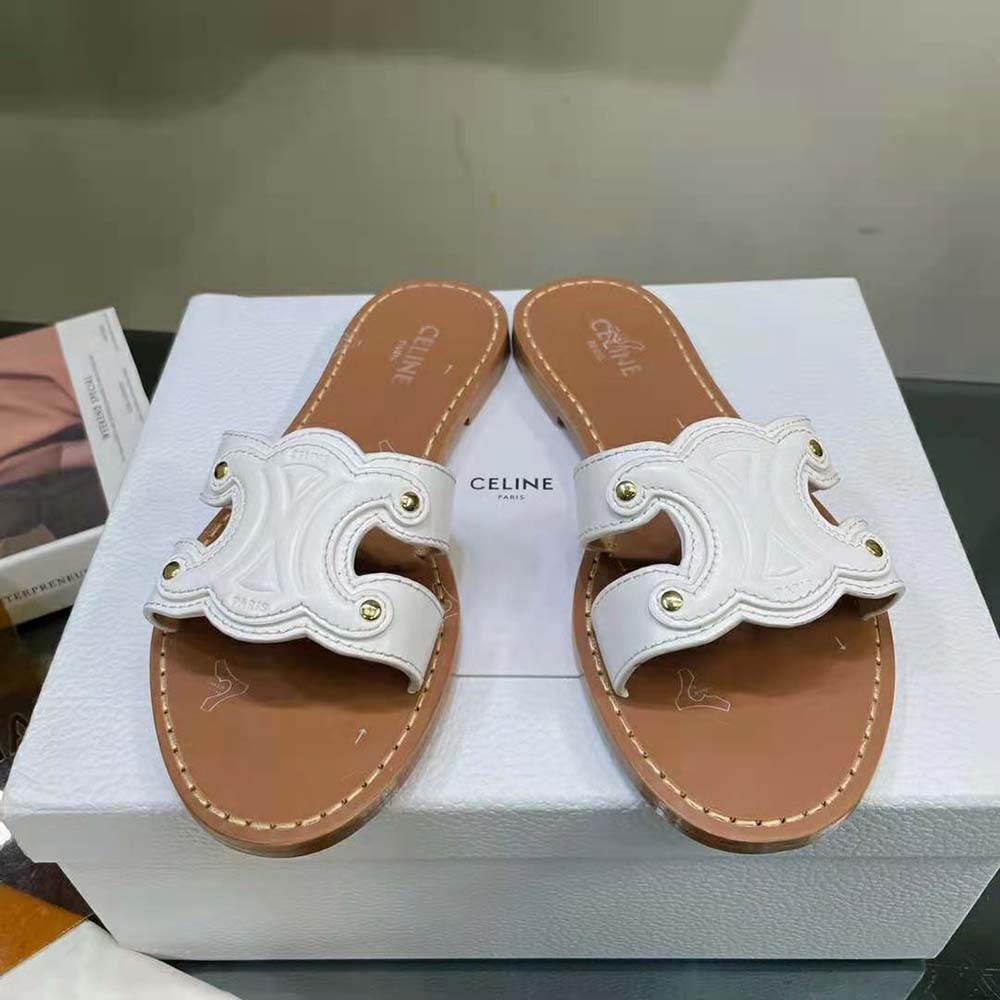 Top angle of white Celine Women Triomphe Mule highlighting smooth leather finish