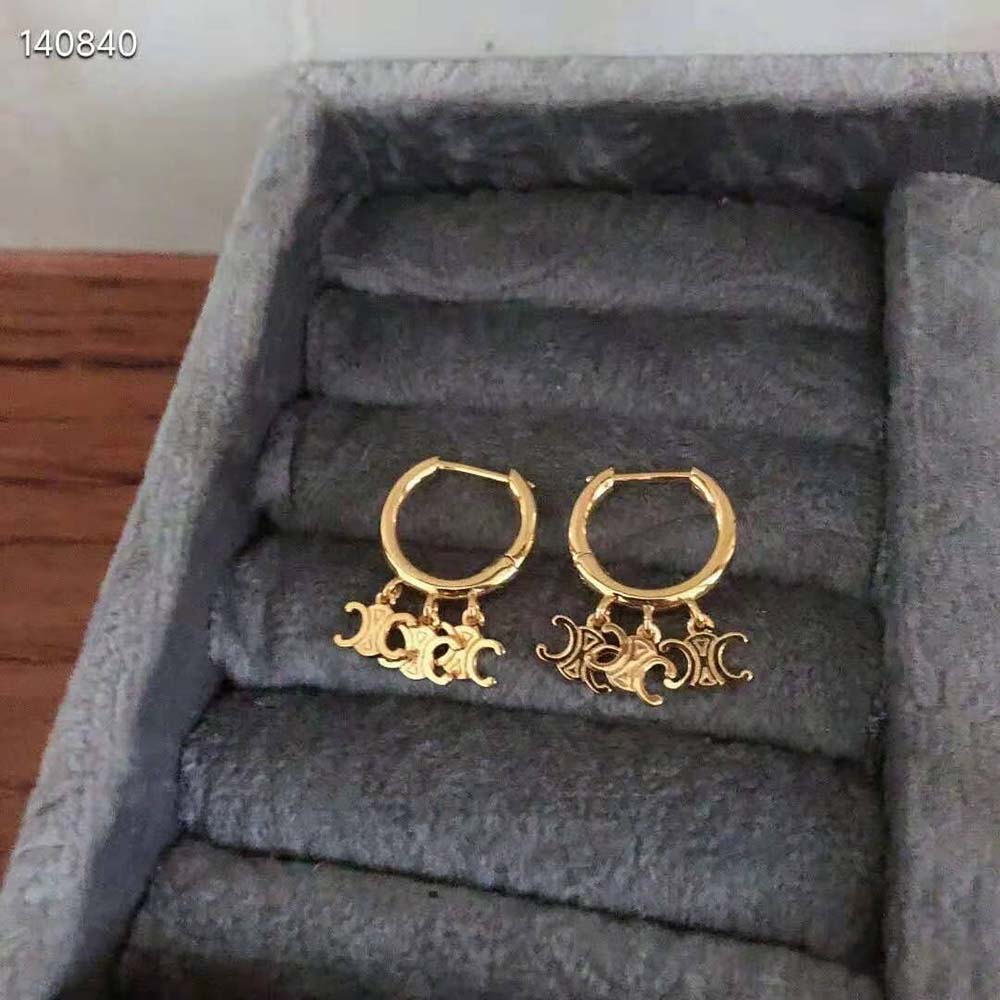 Side view showing secure closure of Celine Women Triomphe Trio Hoops