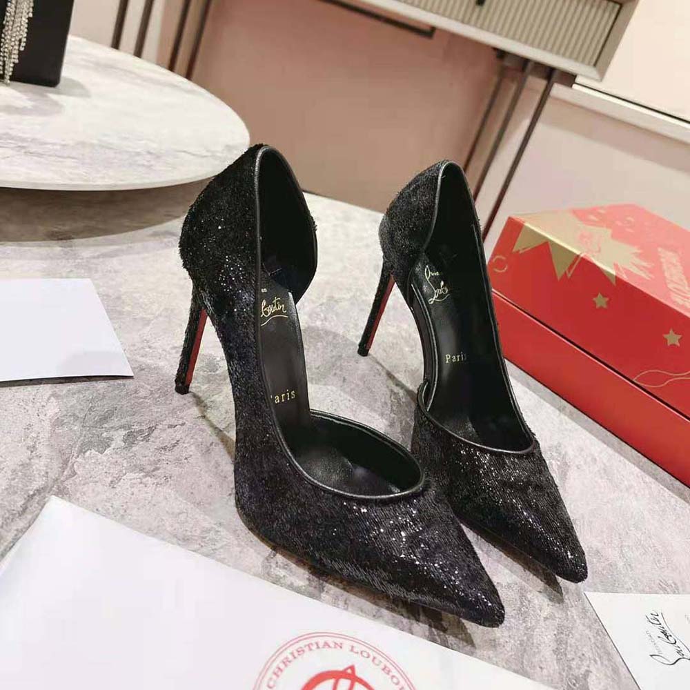 View of iconic red sole on Christian Louboutin Women Iriza high heel
