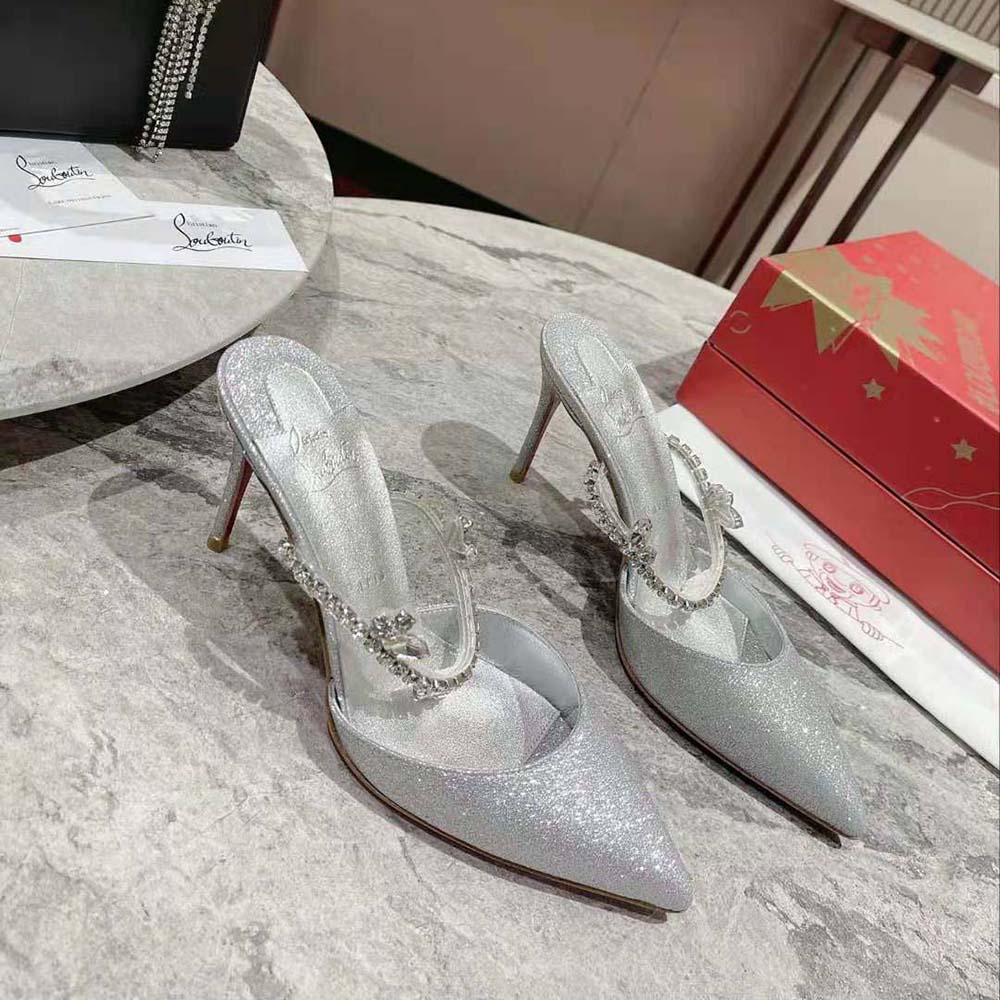 View of signature red sole on Christian Louboutin Women Planet Queen heels