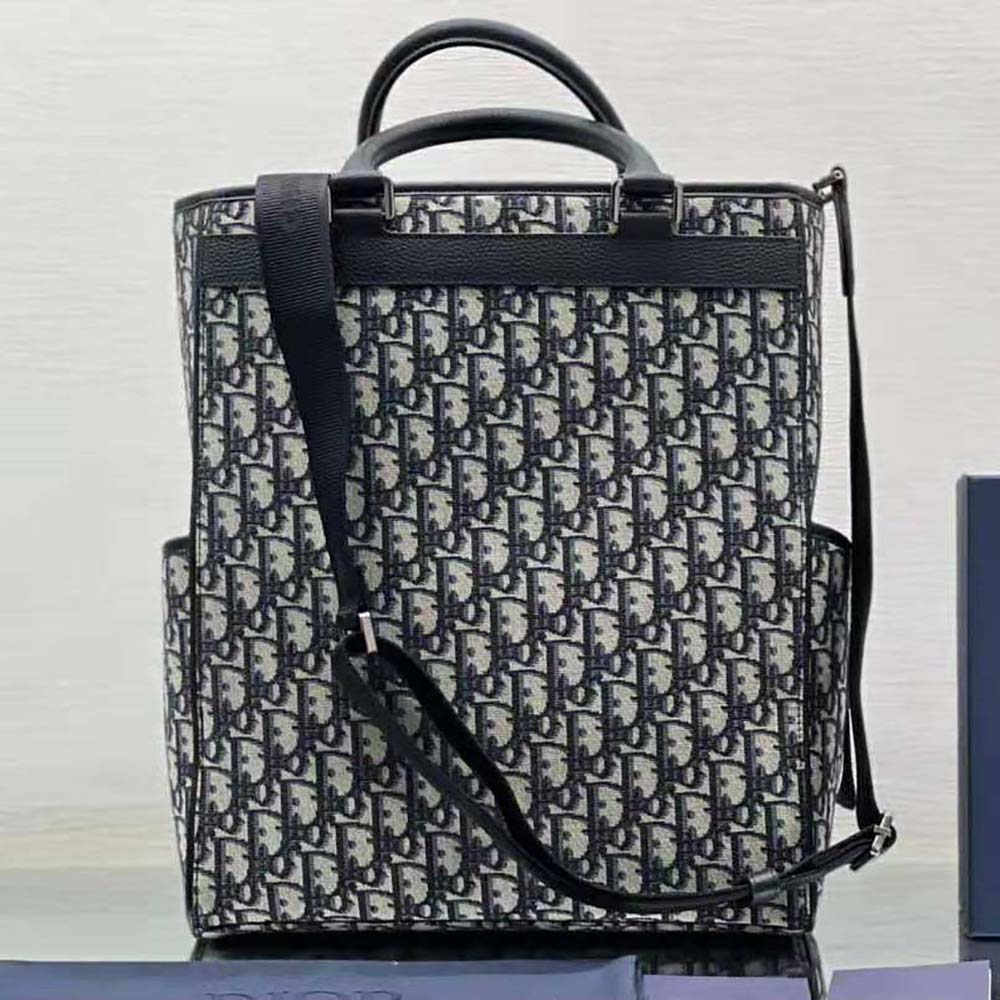 Side view showing spacious silhouette of Dior Men Explorer Tote Bag