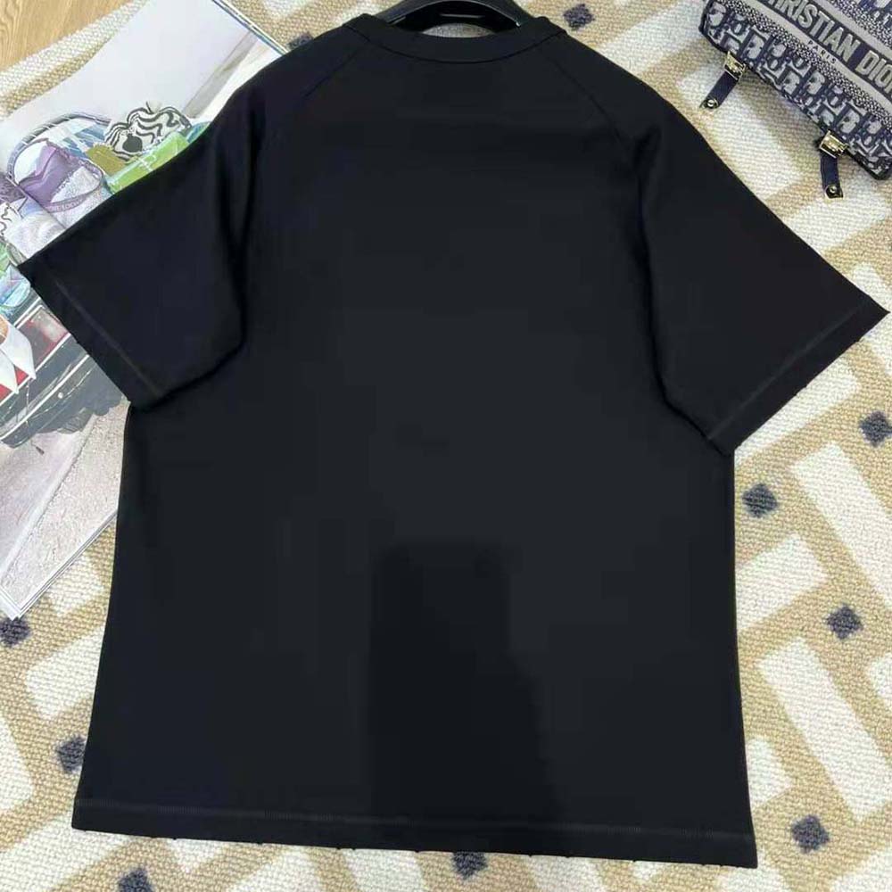 Side profile showcasing relaxed fit on Dior Men Relaxed-Fit Dior by Erl T-shirt