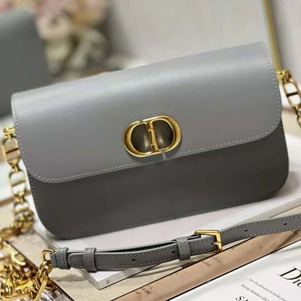 Side profile showing silhouette of Dior Women 30 Montaigne Avenue Bag in gray leather