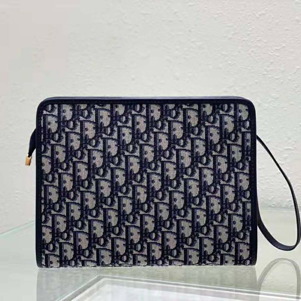 Side angle showing zip closure and silhouette of Dior Women 30 Montaigne Pouch