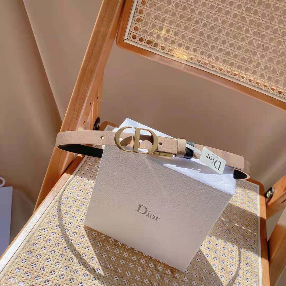 Close-up of Dior ‘CD’ buckle on reversible belt leather