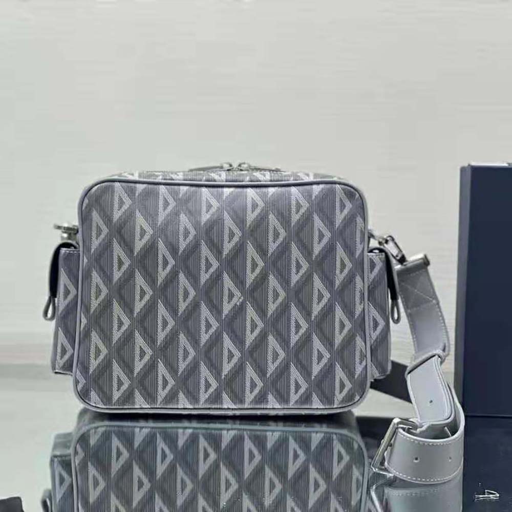 Side profile showing compact silhouette of Dior Men Hit the Road Messenger Pouch