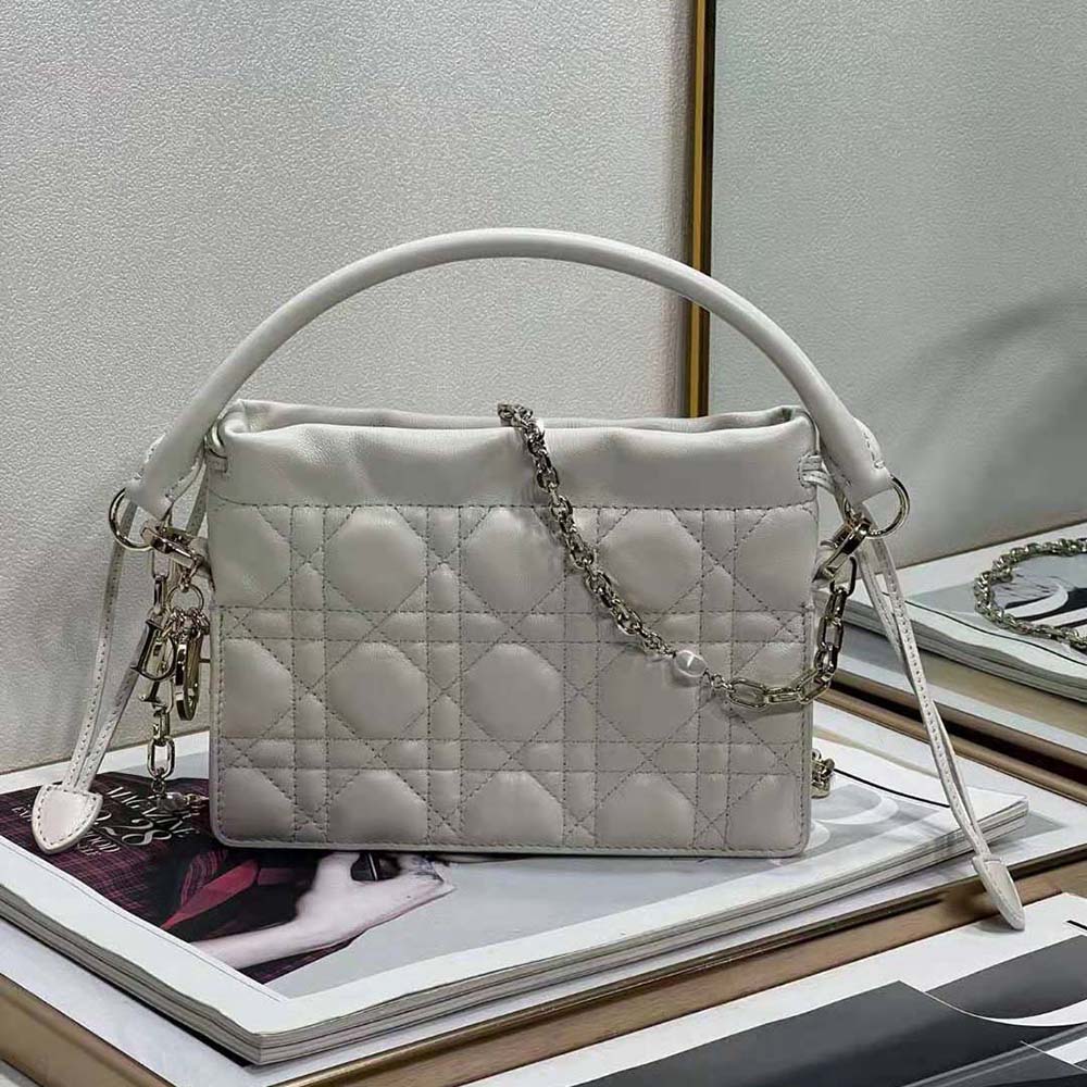 Close-up of latte lambskin and cannage stitching on Lady Dior mini bag