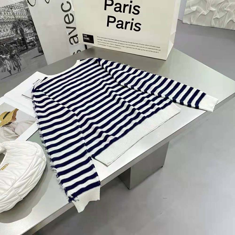 Side angle showing relaxed fit of Dior Women Marinière Sweater