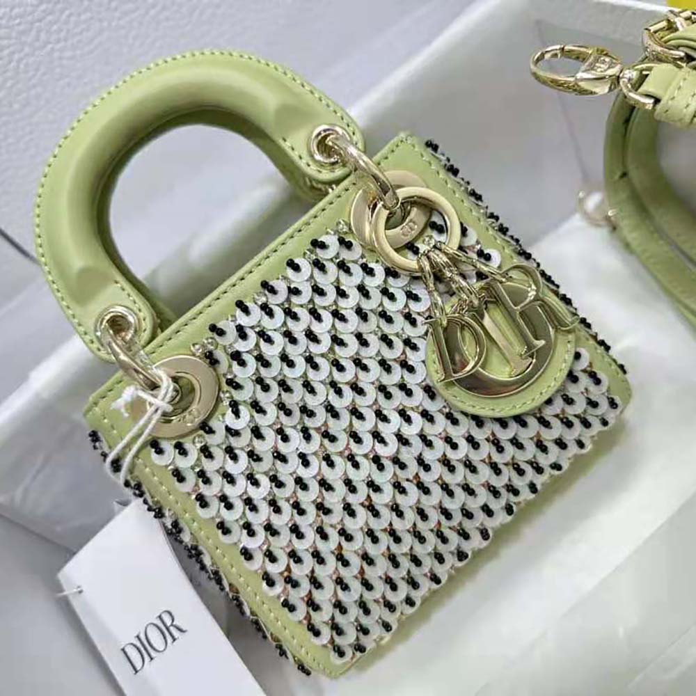 Close-up detail of multicolor sequin embroidery on Dior Micro Lady Dior Bag