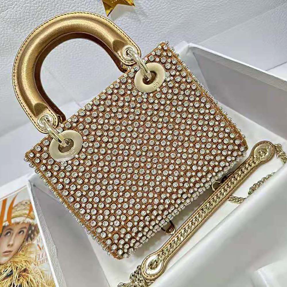 Side angle showing compact silhouette and flap closure of Dior Women Mini Lady Dior Bag