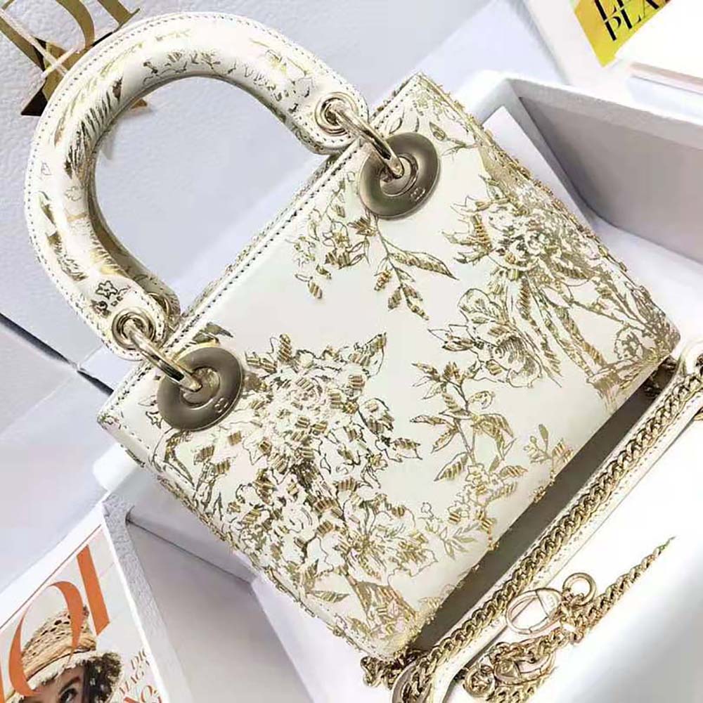 Side angle showing compact silhouette of Dior Women Mini Lady Dior Bag White Calfskin