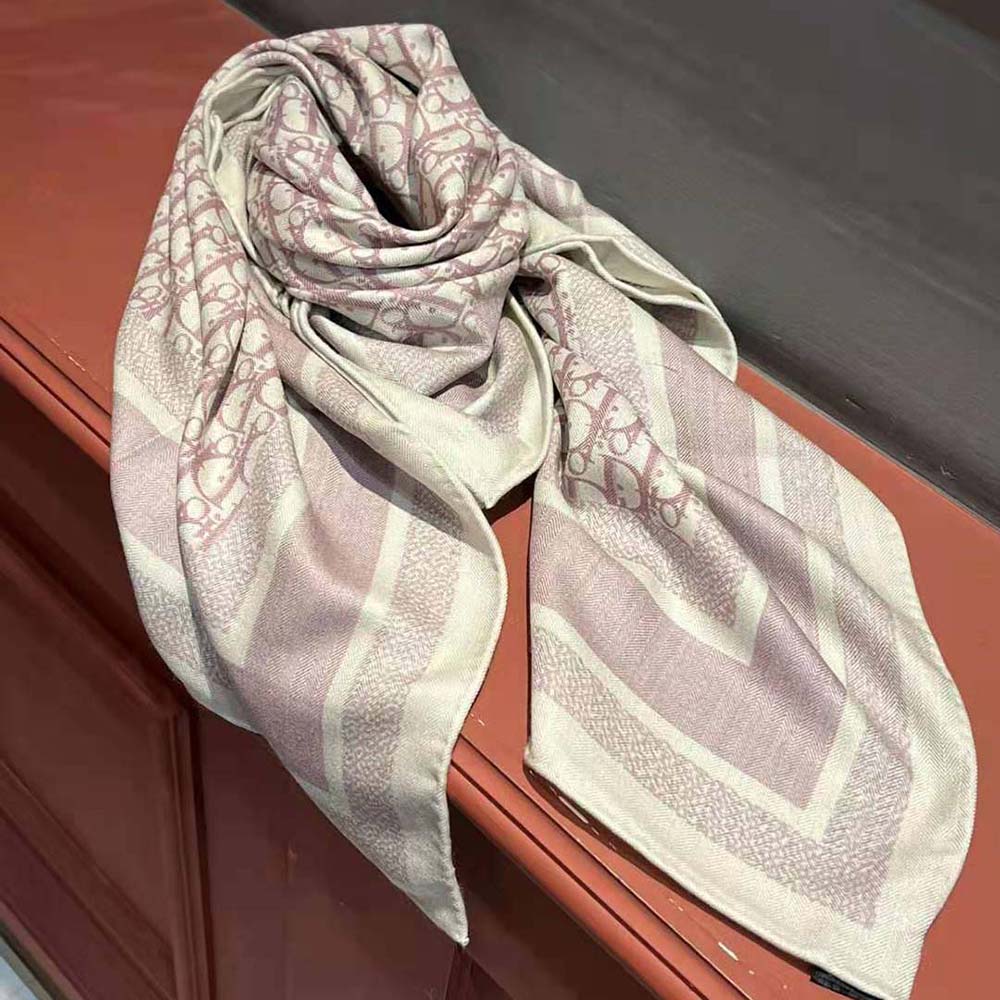 Close-up detail showing silky texture and Diortwin pattern on scarf