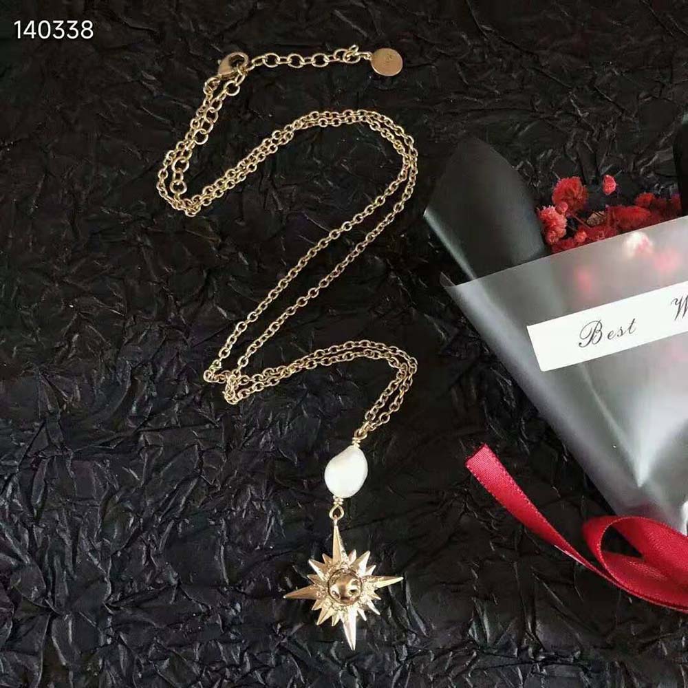 Dior Women Rêve D’infini Long Necklace displayed on black velvet