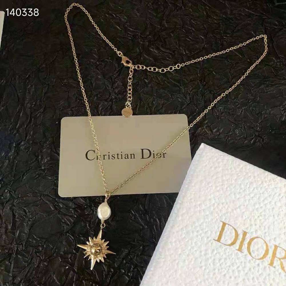 Side view of Dior Women Rêve D’infini Long Necklace gold-finish chain