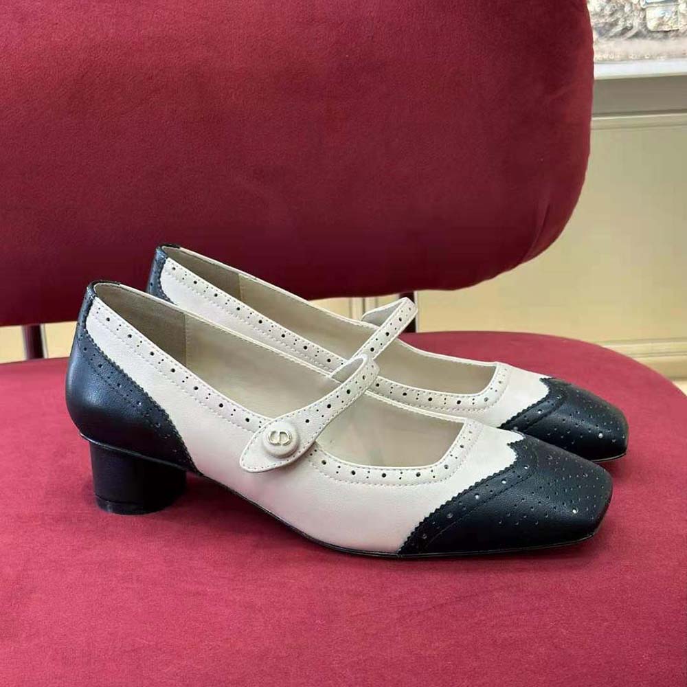 Close-up of Dior stitched logo on perforated calfskin pump