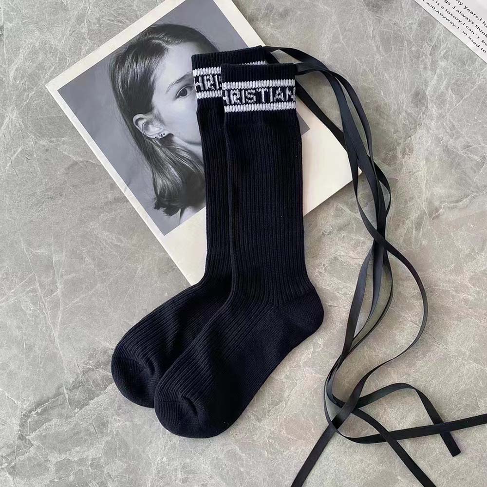 Side view of Dior Women Sporty High Socks showing high sporty silhouette
