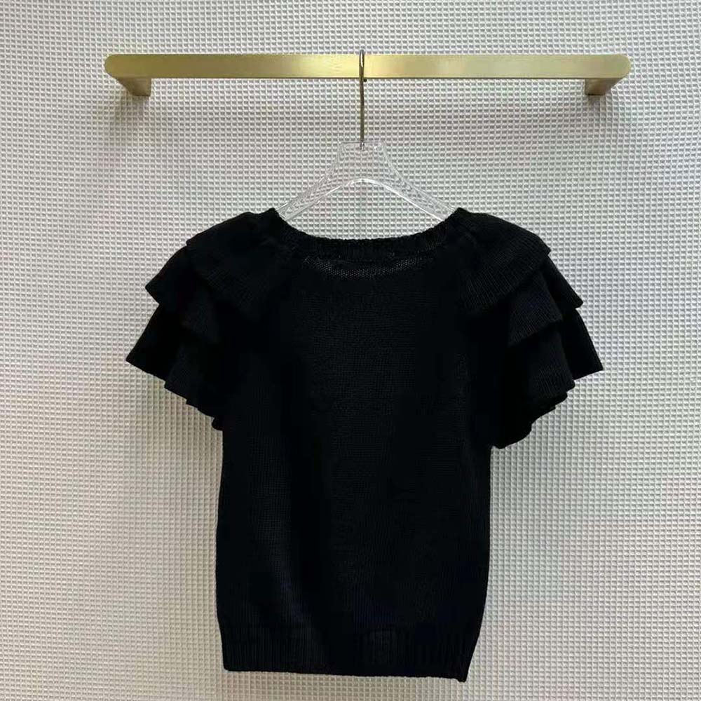 Side profile highlighting silhouette of Dior Women Sweater with Ruffles