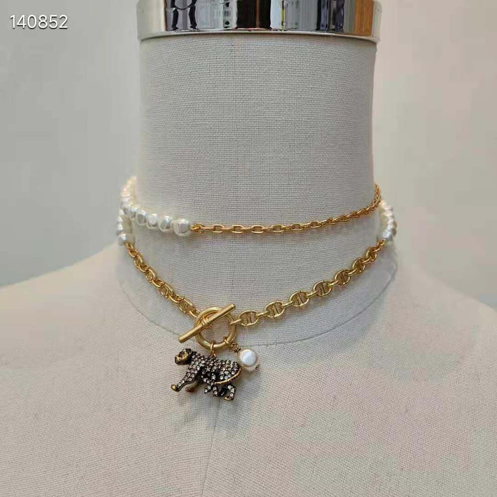 Dior Women Toile De Jouy Necklace on model highlighting signature engraved design