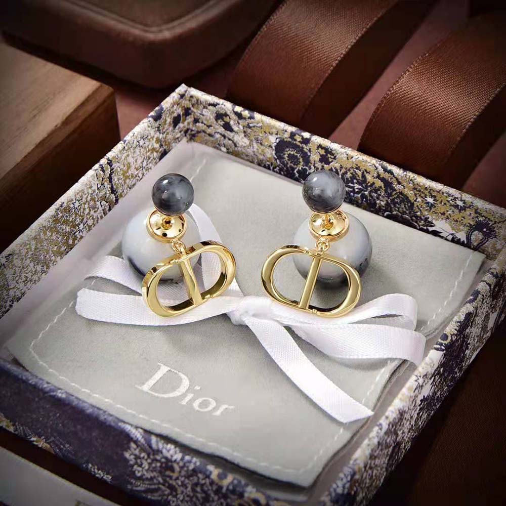 Detail of black jasper pearl and gold-finish metal on Dior Women Tribales Earrings