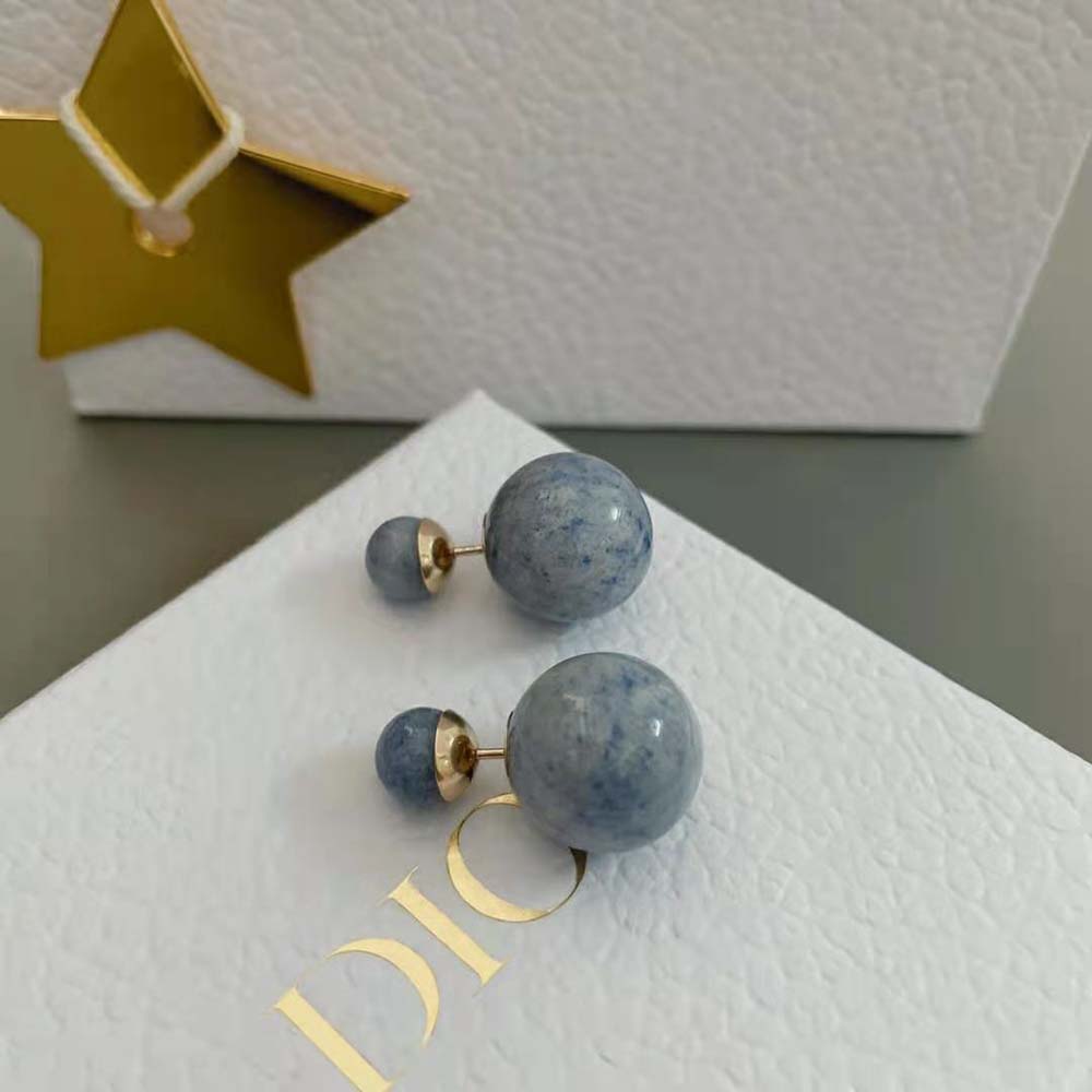 Side angle showcasing silhouette of Dior Women Tribales Earrings Gold-Finish Metal