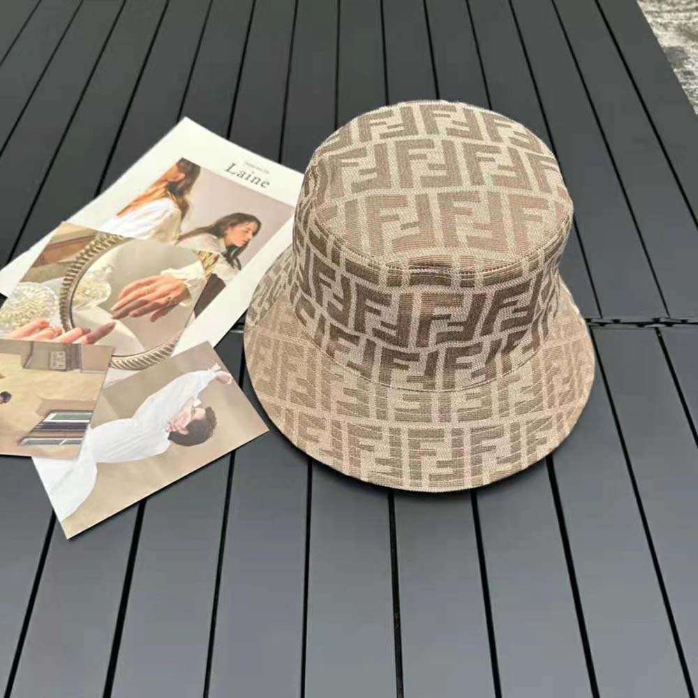 Close-up of fabric texture and Fendi logo on the hat