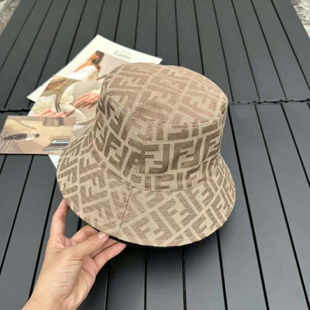 Side angle showcasing silhouette of Fendi Women Brown Fabric Hat