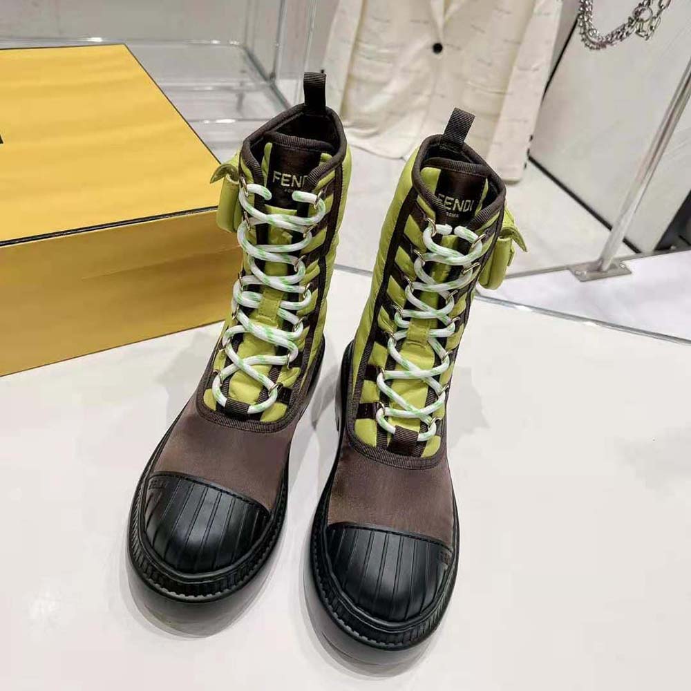 Close-up of silver hardware on Fendi Women Domino Acid Green Nylon Biker Boots