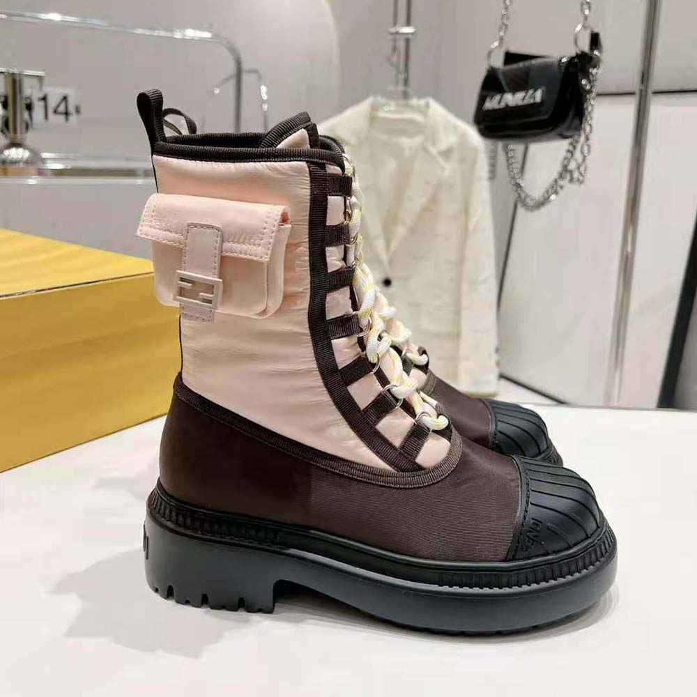 Side profile of Fendi Women Domino Pink Nylon Biker Boots highlighting chunky sole