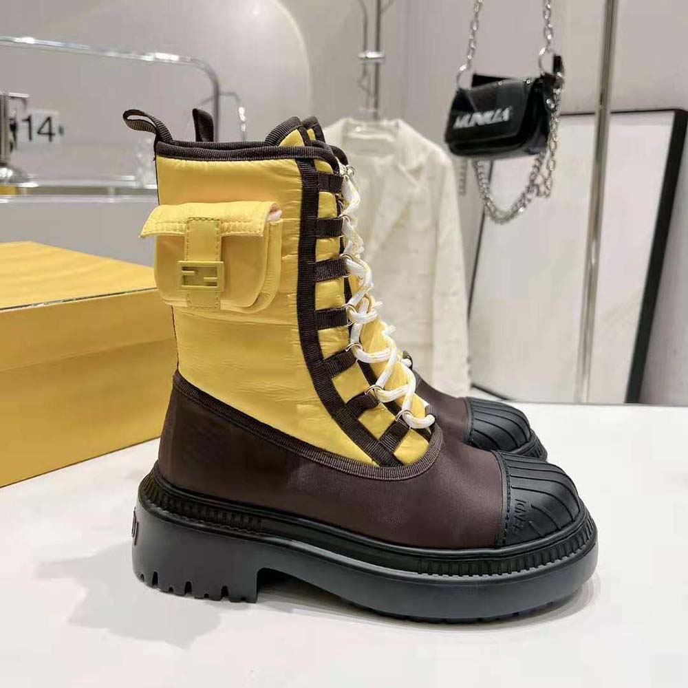 Close-up of yellow nylon and branded metal hardware on Fendi Women Domino Boots