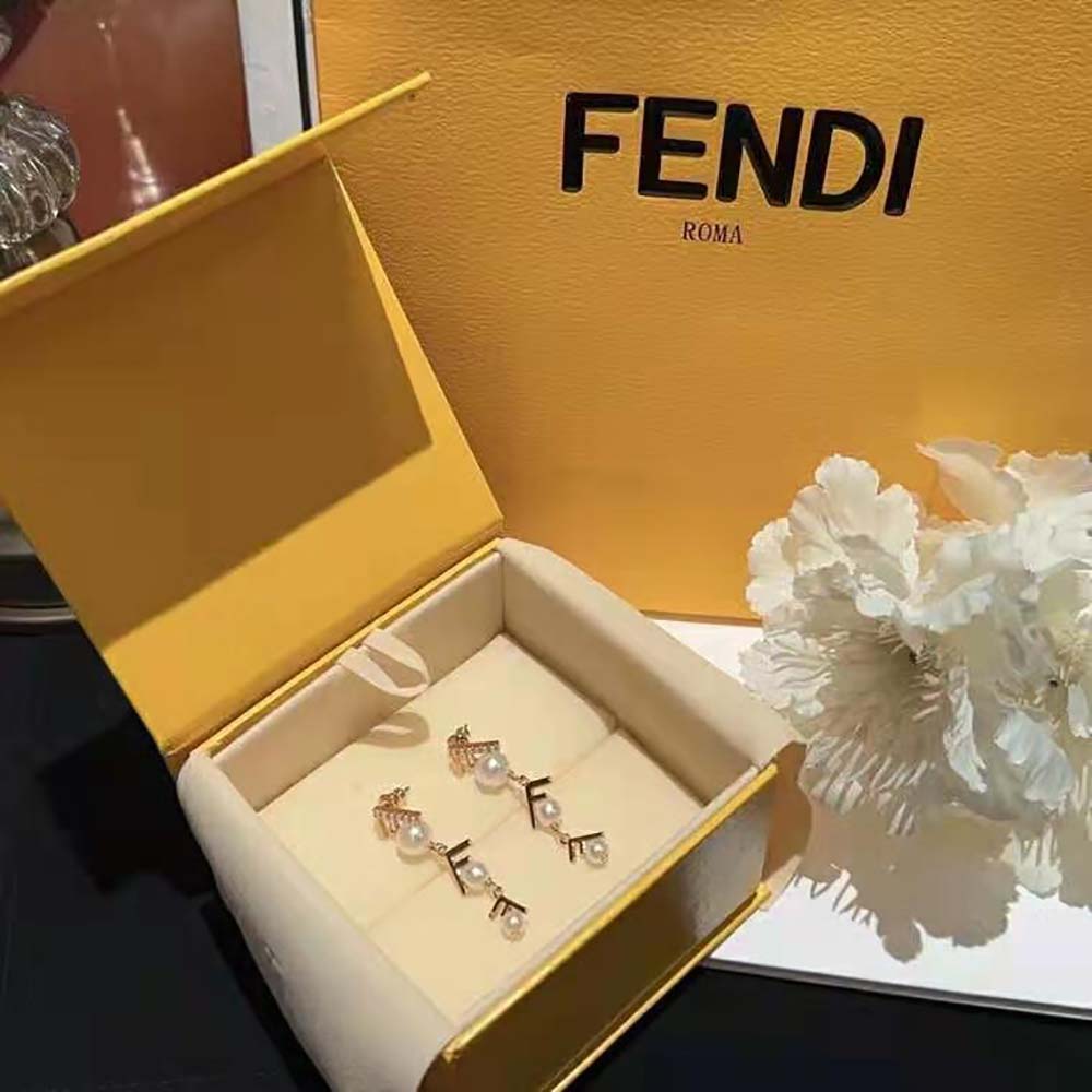 Close-up on Fendi logo detail of Women First Earrings Gold-colored