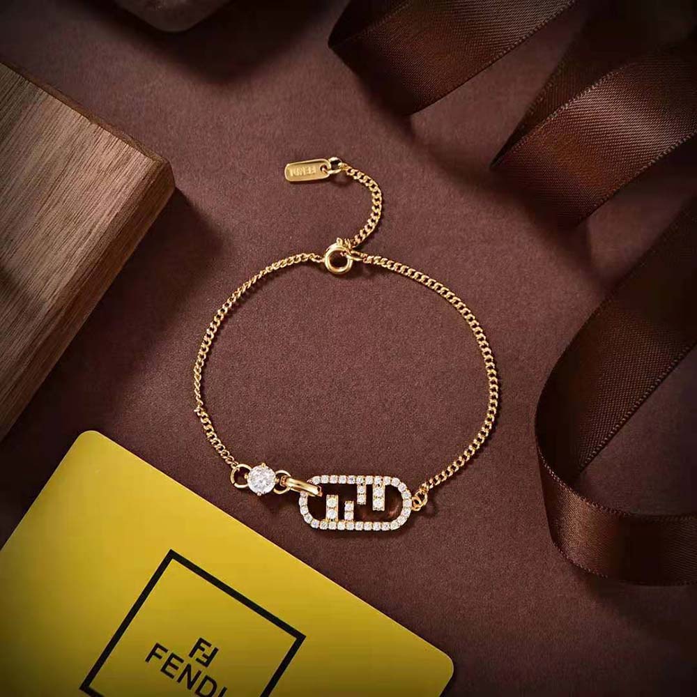 Styled shot of Fendi Women O’Lock Bracelet Gold-Colored on wrist