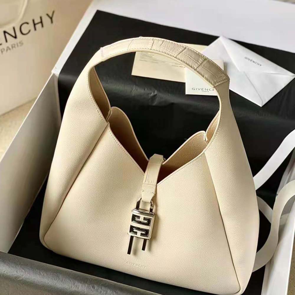 Close-up of gold-tone G-shaped closure on Givenchy Medium G-Hobo Bag
